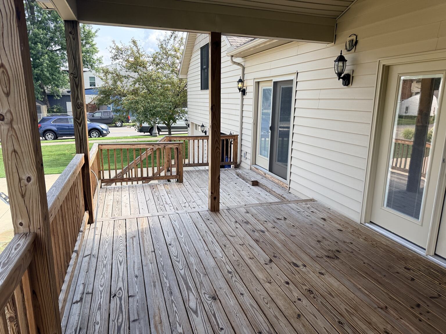 Decking and entrance before deck staining